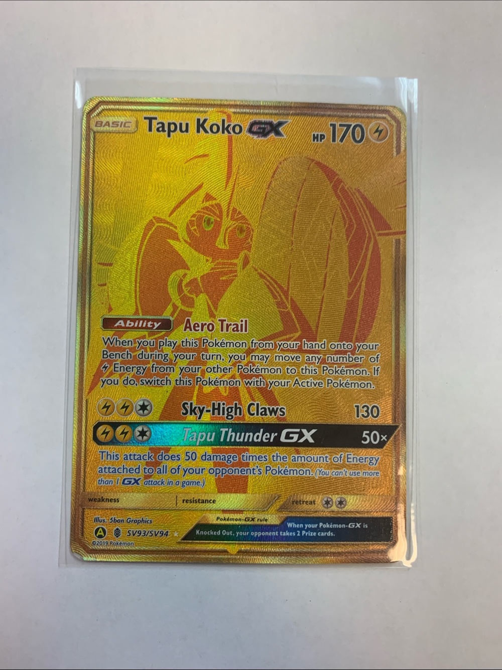 Pokemon Tapu Koko GX Holo Gold Yellow Card